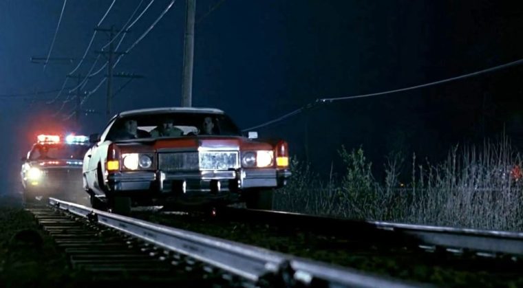 Film - Page 8 Groundhog-Day-movie-cars-Cadillac-Eldorado-driving-on-train-tracks-760x419