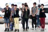 [RAND] Artistas da SM cumprimentam os fãs no aeroporto a caminho da 'SMTOWN Live World Tour'  9cafde211738733
