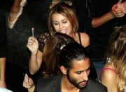 Pics of Ashley and Miley dancing in the VIP room last night   Bd062196639321