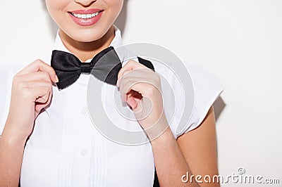 Bow Tie Images Adjusting-her-bow-tie-close-up-young-short-hair-woman-white-shirt-suspenders-41004823