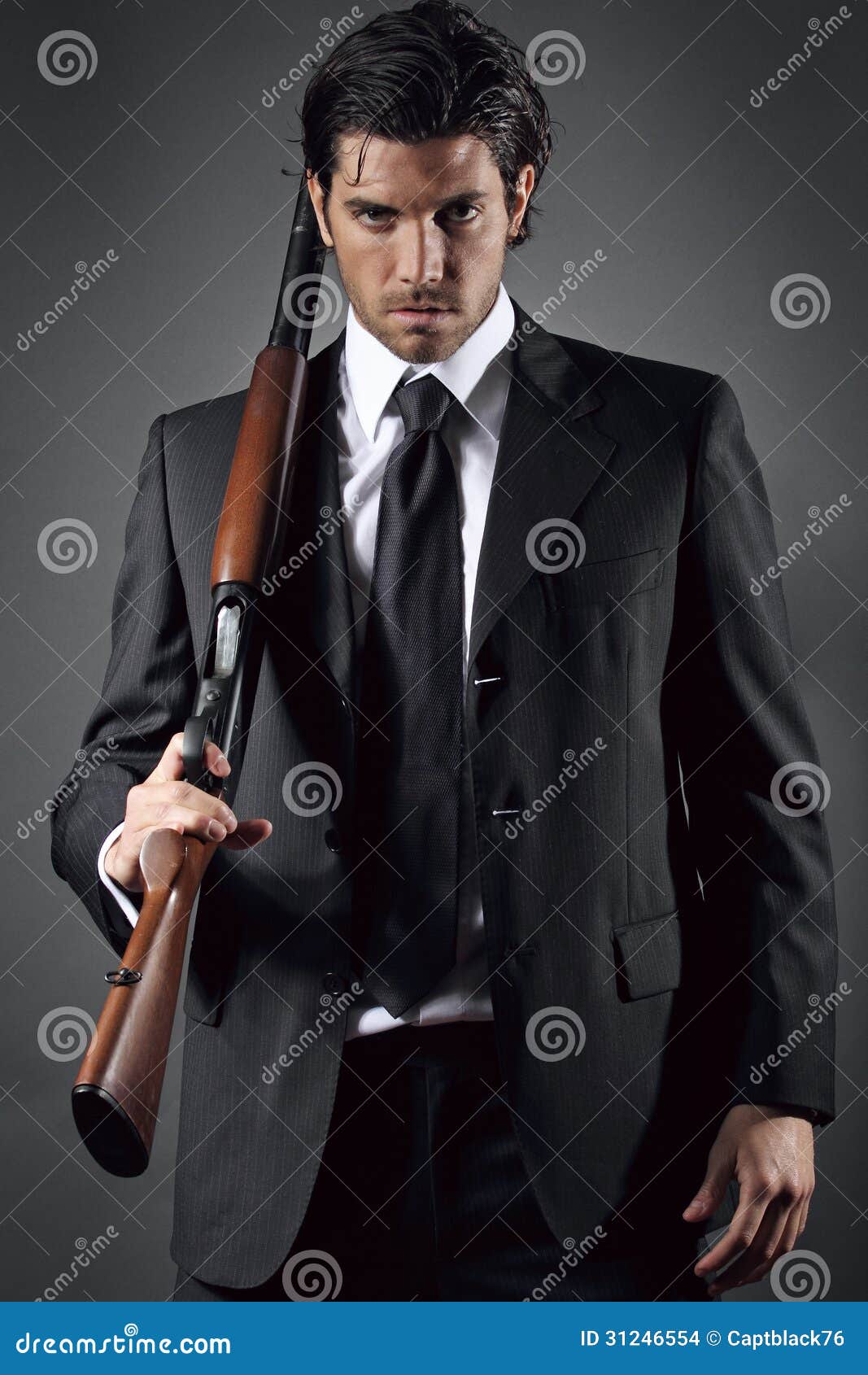 Predloži avatar za osobu iznad  - Page 10 Attractive-elegant-man-posing-shotgun-grey-backdrop-portrait-31246554