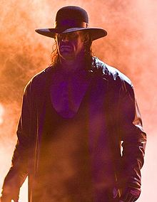 [บทความ]Road to WrestleMania XXVII Chapter 1: The road begins here 220px-undertaker_with_fire