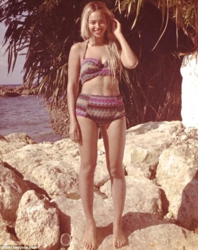 Beyonce Show Off Banging Body In Jamaica While Drinking Jamaica’s Red Stripe Beyonce-bikini-Jamaica-1