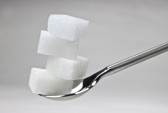 Bonne Mardi 9634244-piece-of-sugar-cubes-on-a-spoon