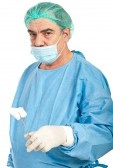 Today's Sun - 7th September 2014 8816148-mature-surgeon-in-uniform-with-mask-holding-forceps-with-bandage-isolated-on-white-background