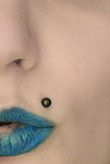 Les Piercings : Variétés du visage au corps (Visage) Piercing_madonna