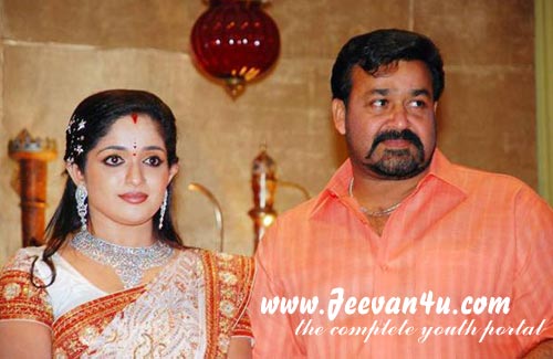 நடிகைகளின் திருமண போட்டோக்கள். - Page 2 Kavya%20Marriage%20Reception%20Mohanlal%20PHotos