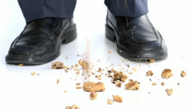 Slim's Drawing  Stock-footage-closeup-of-cookie-crumbs-falling-to-white-floor-in-front-of-businessman-tough-cookie-to-crumble