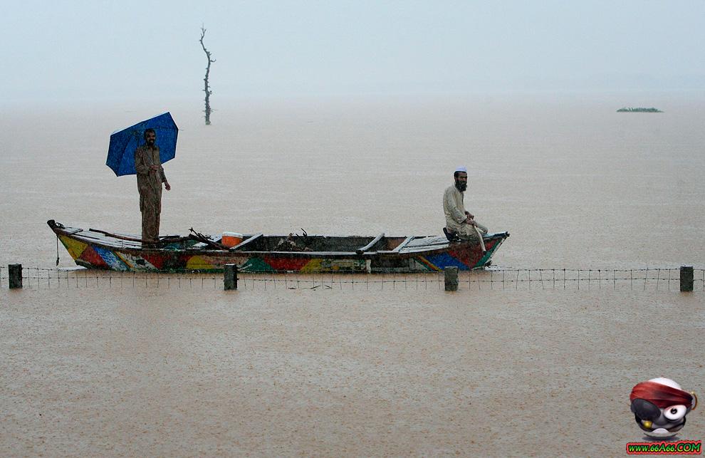 فيضانات باكستان بالصور والفيديو والتقرير عن الكارثة Domain-33b246cd2d