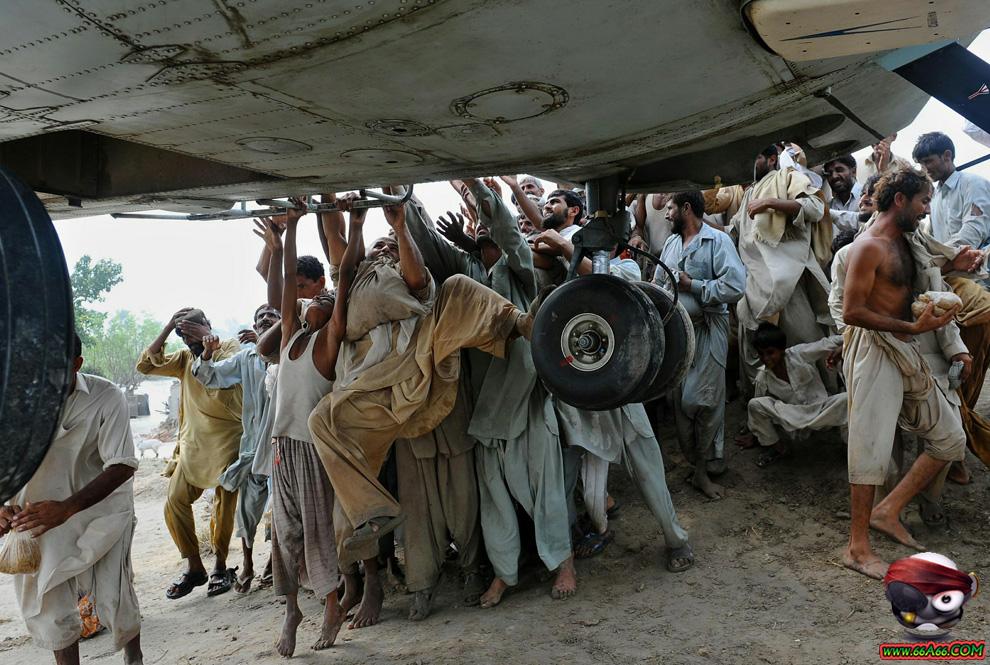 فيضانات باكستان بالصور والفيديو والتقرير عن الكارثة Domain-4cc0810b35
