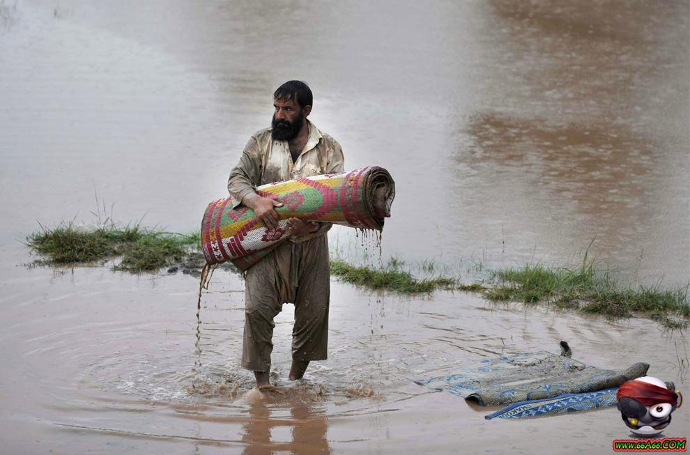 فيضانات باكستان بالصور والفيديو والتقرير عن الكارثة Domain-8c37976290