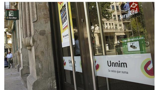 BBVA eliminará 314 sucursales y 1.265 puestos de trabajo tras la integración de Unnim Bbva-unnim-efe--644x362