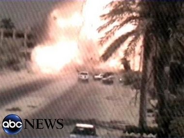 حرب المدن ومقاومة التمرد من التدريب إلى الميدان  *ذئاب البحر* A_car_bomb_explosion_is_seen_near_a_financial_compound_shown_at_left_in_western_baghdad