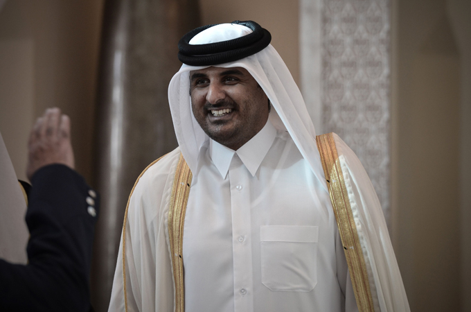 Sheikh Hamad bin Khalifa Al Thani says he is handing over power to son and calls on countrymen to lend their support.  201362414390710621_20