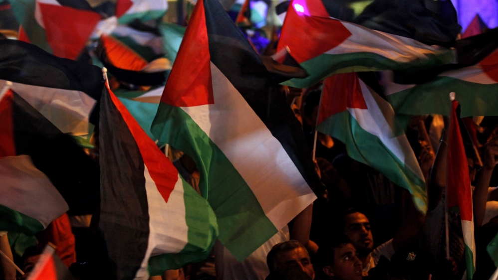 Palestinian flag raised at UN for first time 169bd95780ec44f99b5b178f412bd15f_18