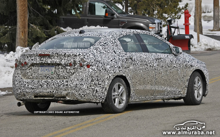 	شيفرولية كروز 2015 تحمل نفس مقدمة شفرولية سونيك Chevrolet Cruze 2015 2015-Chevrolet-Cruze-spied-rear-three-quarter-2