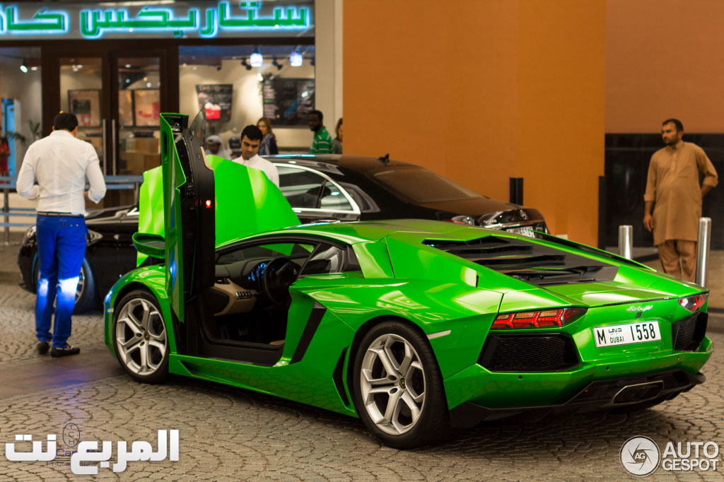 “بالصور” لامبورجيني افنتادور باللون الأخضر اللامع في مدينة دبي تجذب الانظار Lamborghini-aventador-lp700-4-c265215122013173751_1