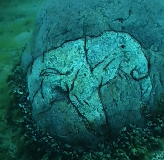 Researchers find a rock with a carving of a Mastodon at the underwater Stonehenge of Lake Michigan 11111