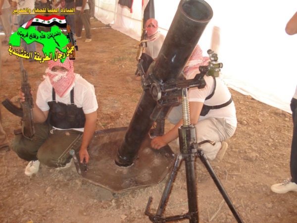عاجل جيش رجال الطريقة النقشبندية قصف مقر للعدو الامريكي بتاريخ 10/9/2012 176