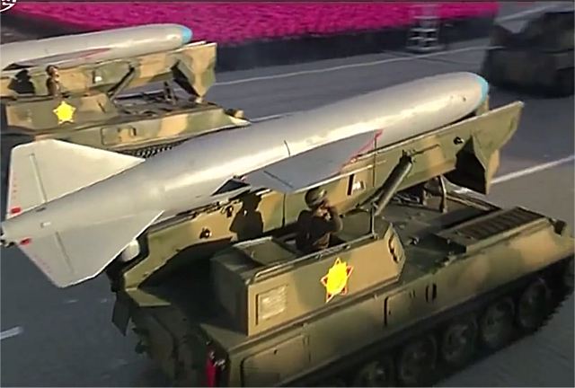 استعراض جيش كوريا الشماليه .......2015  North_Korea_military_parade_10_October_2015_armoured_combat_vehicles_missiles_artillery_033