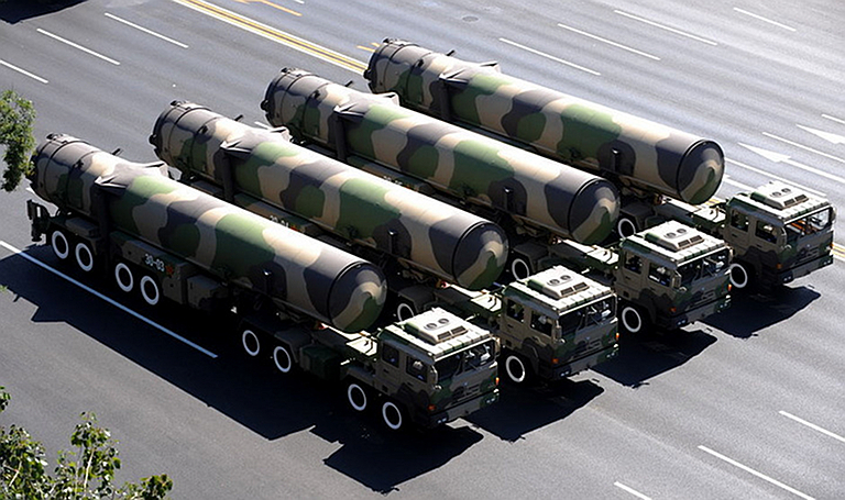 الصاروخ الصينى DF 21D قاتل حاملات الطائرات الامريكيه - صفحة 4 DF-31A-ICBM-TEL-2009-4S