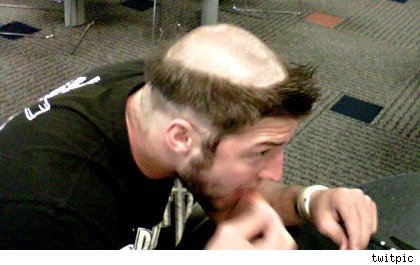 Tebow Gets "Halo" Haircut Via Hazing Tebow-friar-tuck-haircut