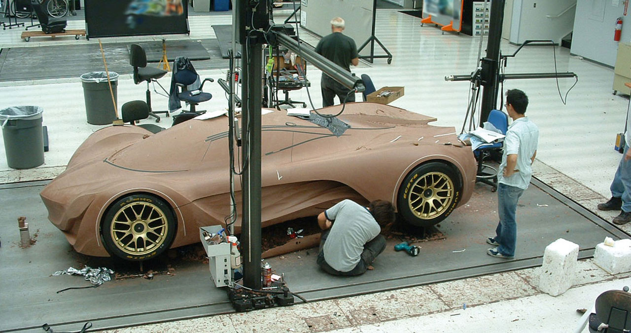 كيف تتم أعمال تصميم و تصنيع السيارة من الفكرة إلى خطوط الانتاج Mazda-Furai-Clay-model-construction-lg