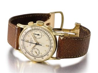 Christies 151110 Patek_philippe_a_fine_18k_gold_chronograph_wristwatch_signed_patek_phi_d5367593h