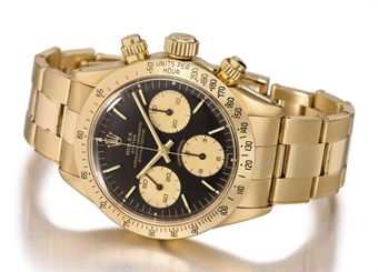 Christies 151110 Rolex_a_fine_18k_gold_chronograph_wristwatch_with_bracelet_signed_role_d5367654h