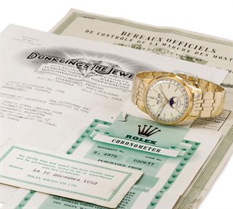 Christies 151110 Rolex_a_very_fine_rare_and_large_18k_gold_automatic_triple_calendar_wr_d5367760h
