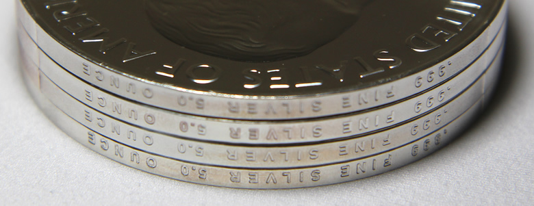 Nuevas onzas de Plata. Photo-of-Edge-Letterings-on-America-the-Beautiful-Five-Ounce-Silver-Coins