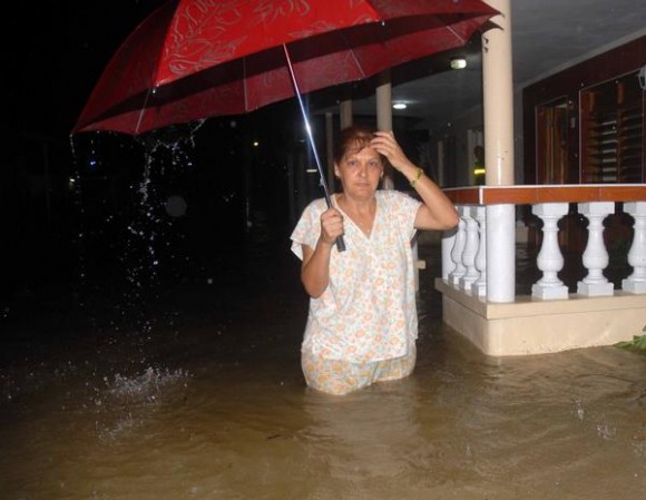 Cuba sigue recibiendo fuertes lluvias que están provocando graves inundaciones con miles de evacuados Sancti-spiritus-3-580x449