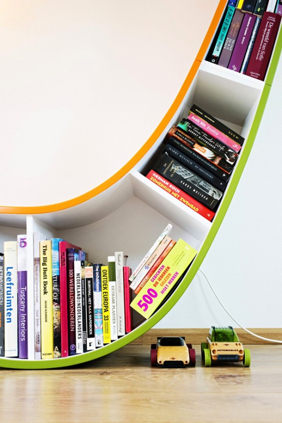 مكتبة عصرية تشمل ركن للمطالعة Creative-bookshelf-to-sink-into-the-universe-of-reading-5-554x831