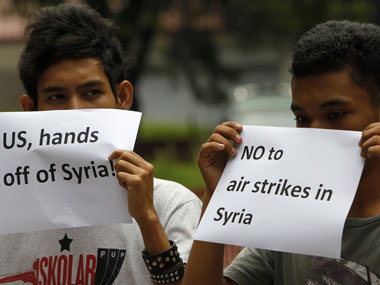 5 reasons why the us wont go to war with syria SyriaStudentsProtest380_Reuters