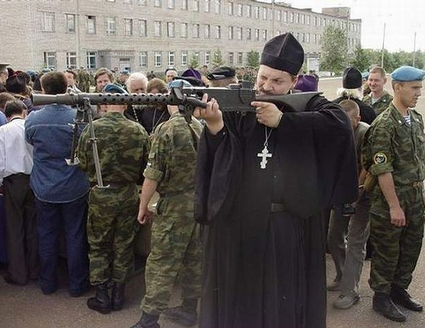 Funny Pictures... - Page 3 2389-priest-with-gun