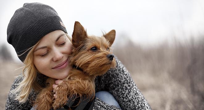 New Year’s Resolutions and Checklist for Pet Owners Woman-and-dog