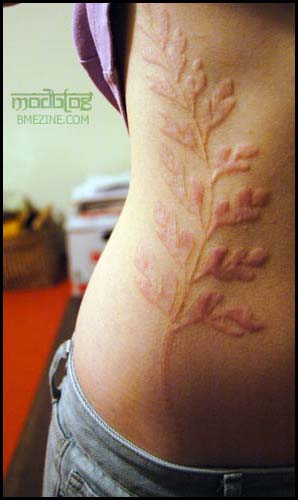 Les Modifications Corporelles. - Page 2 Scarification