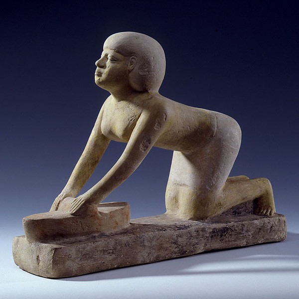 Figure of a woman grinding corn  0019