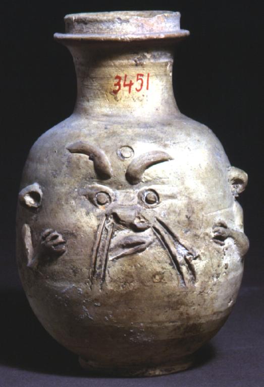 Vaso in terracotta con il volto del dio Bes 03451
