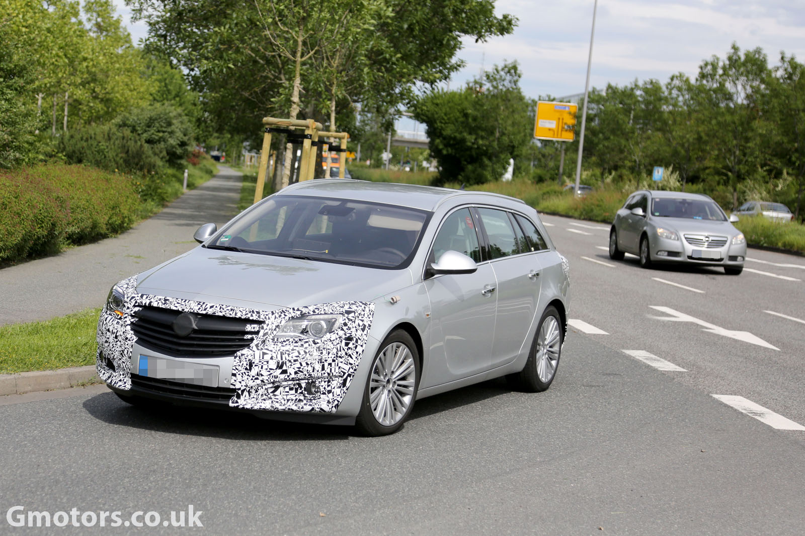 2013 - [Opel] Insignia Restylée - Page 8 Opel-Vauxhall-Insignia-Sports-Tourer-facelift-4