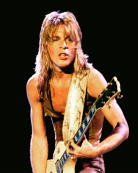 Juego :Imagenes de musicos RandyRhoads_metal