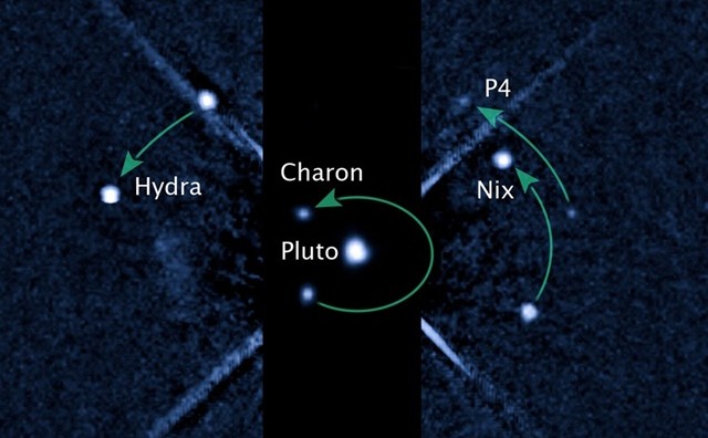 La sonde New Horizons a buggé après avoir pris les premières images en couleur de Pluton Pluton-Nix_thumb-e1311233845132