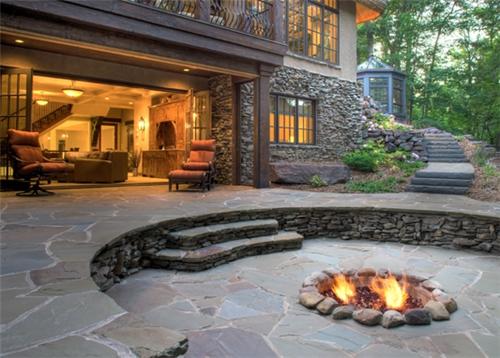  ديكور حدائق منزلية و تصاميم تحوّل حديقة منزلك إلى جنتك الخاصة In-ground-fire-pit-fire-ring-barkley-landscapes-design-group_665