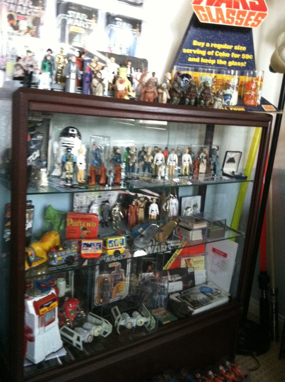 Current set up and still working...Counter Display, 12 backs, and other collectibles Photo110