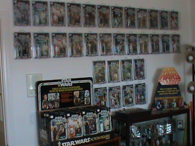 Current set up and still working...Counter Display, 12 backs, and other collectibles Toy_ro10