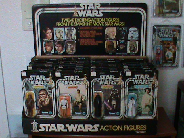 Current set up and still working...Counter Display, 12 backs, and other collectibles Toy_ro11