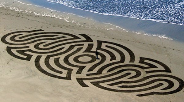 Artisti që vizaton mbi rërë  27