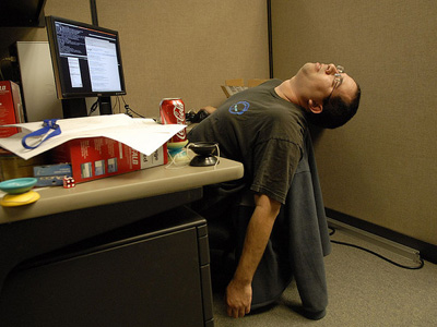 Best strategies to survive a business day in London Sleeping-work-cubicle-stressed-office