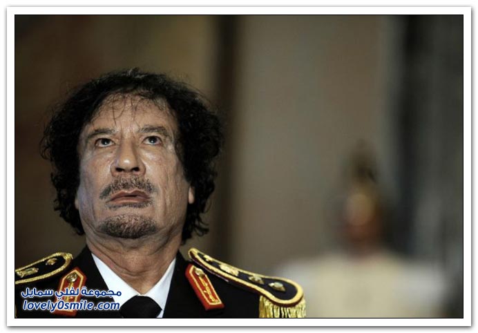 القذافي خلال مسيرة لـأكثر من أربع عقود فعلا مجنون شاهد Gaddafi-35