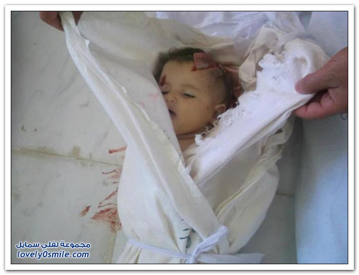 صور أطفال الحولة قبل المجزرة وبعدها . Images-of-the-Hula-massacre-in-Syria-13